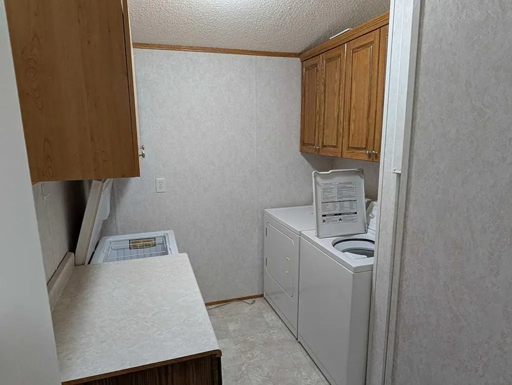 211 Railway Avenue Coaldale AB T1M 0A8