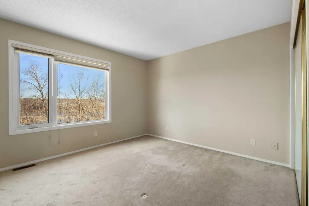 103 Riverside Way SE Calgary AB T2C 3V8