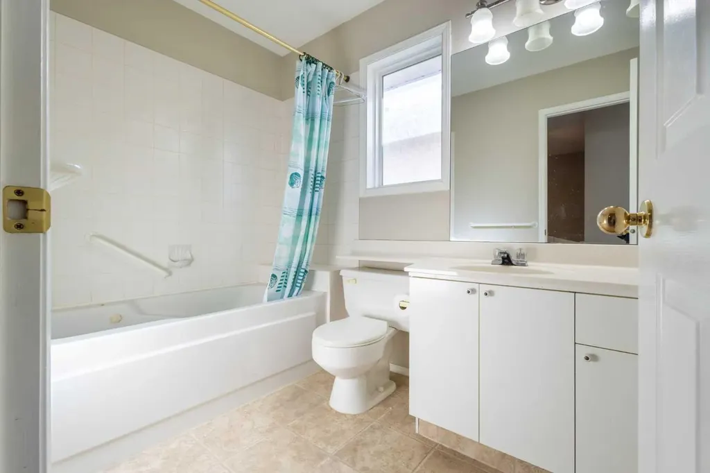 103 Riverside Way SE Calgary AB T2C 3V8
