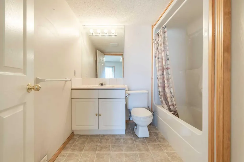 103 Riverside Way SE Calgary AB T2C 3V8