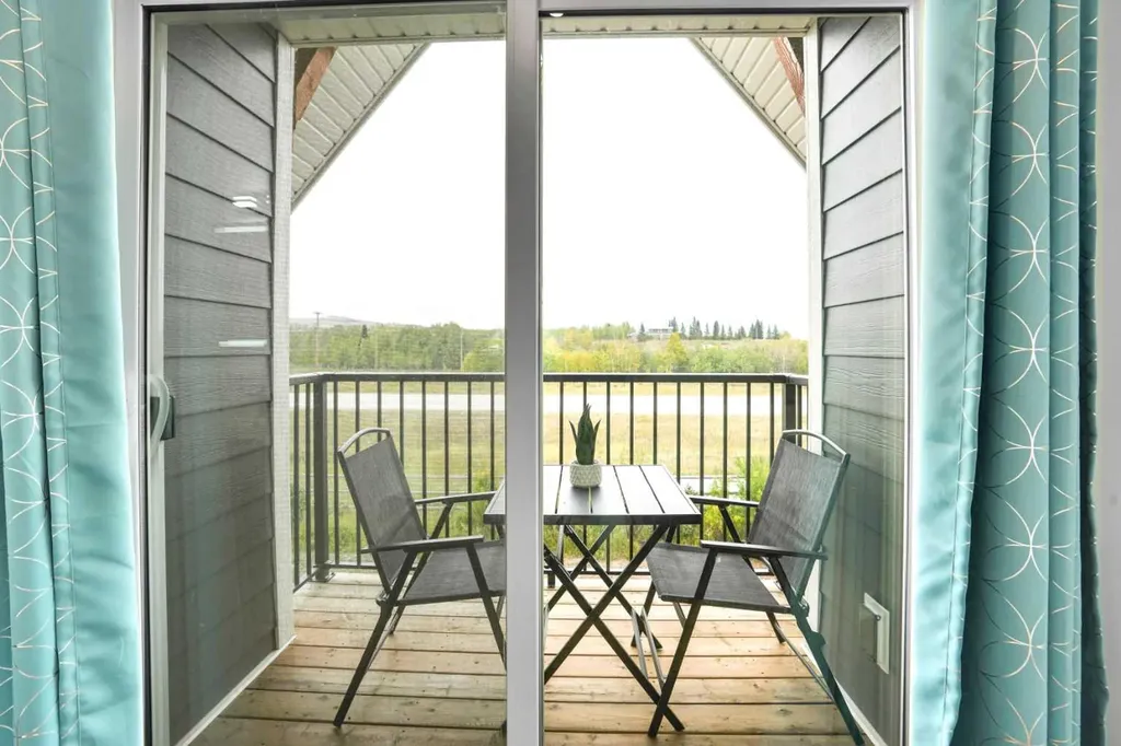 44 Cottageclub Lane Rural Rocky View County AB T4C 1B1