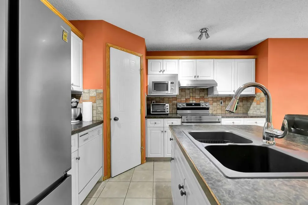 332 Harvest Hills Drive NE Calgary AB T3K 4H7