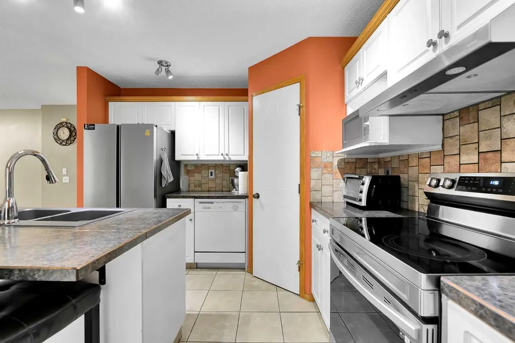 332 Harvest Hills Drive NE Calgary AB T3K 4H7