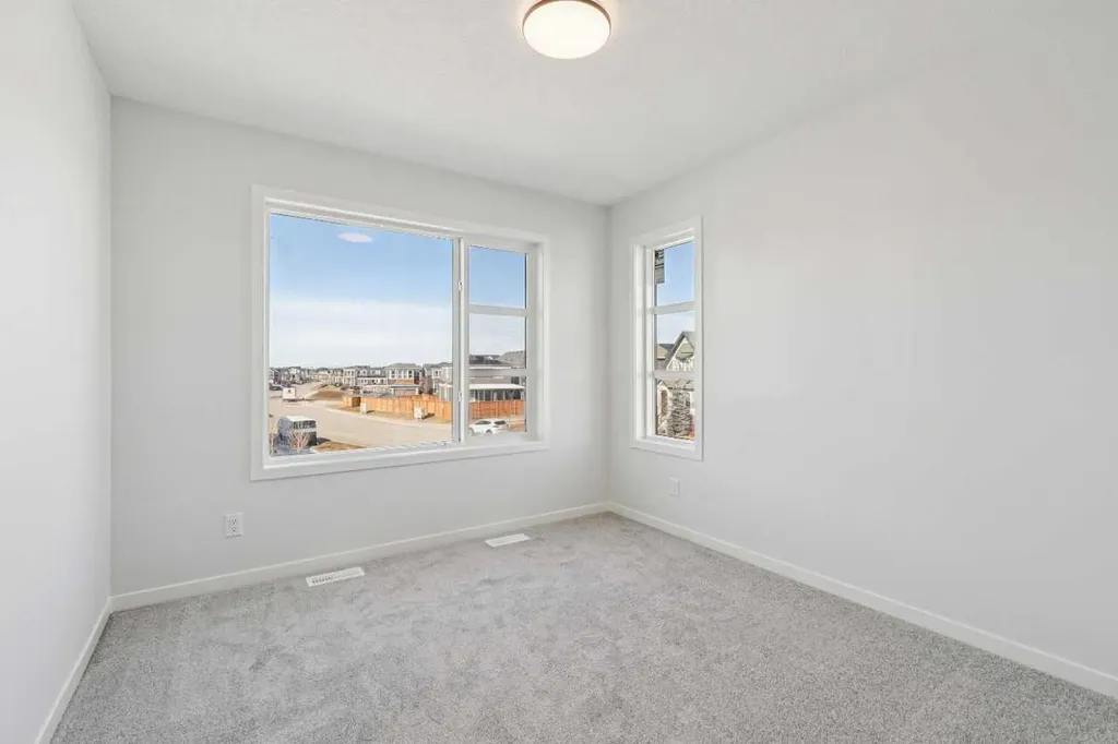 572 Belmont Heath SW Calgary AB T0L0X0