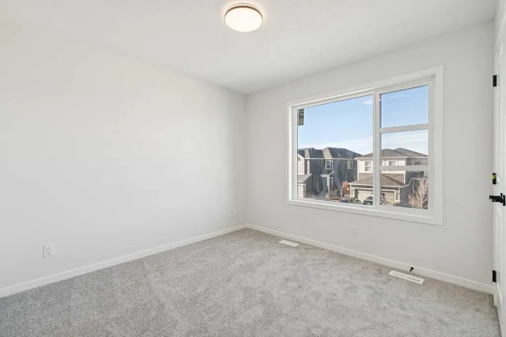 572 Belmont Heath SW Calgary AB T0L0X0