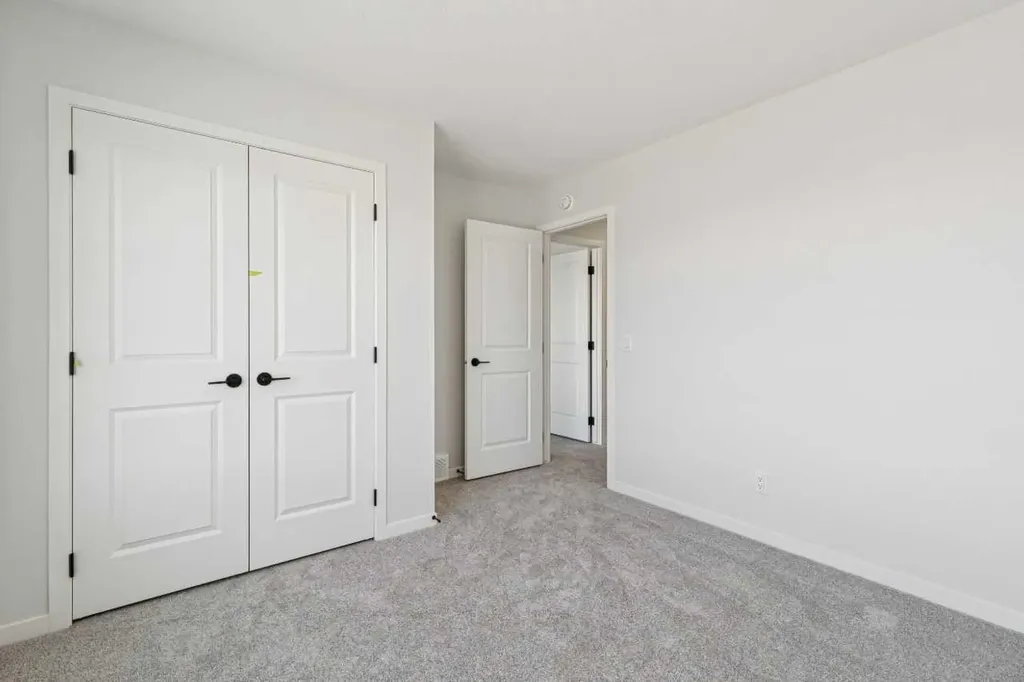 572 Belmont Heath SW Calgary AB T0L0X0