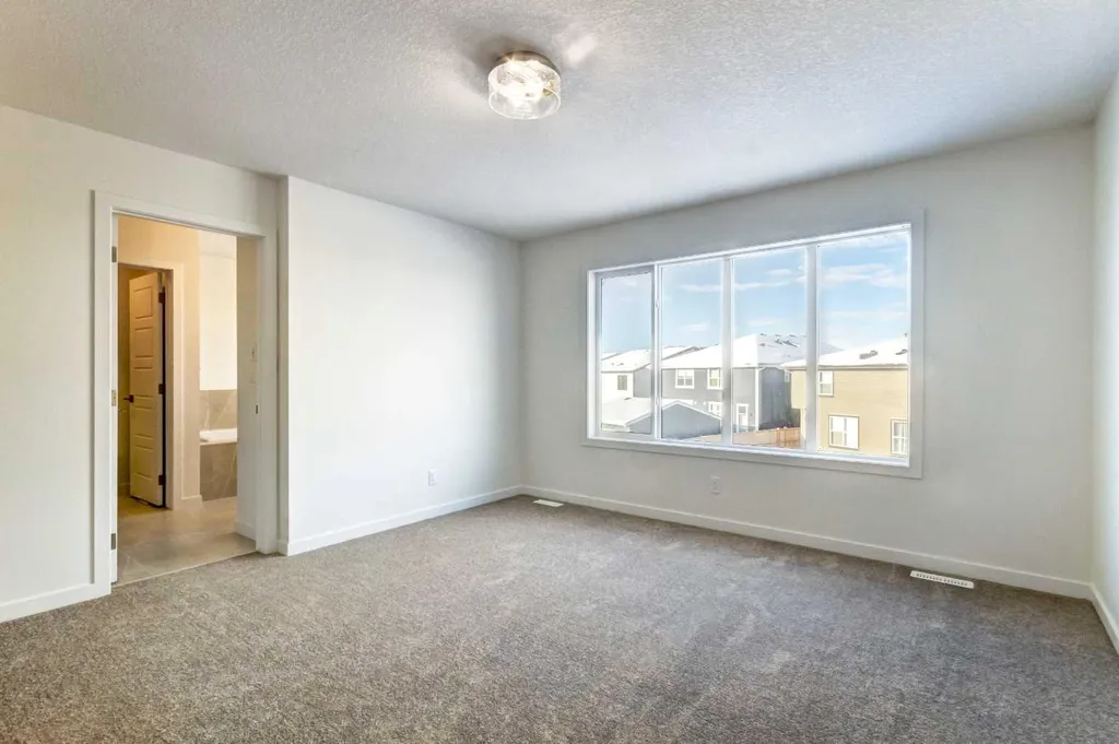 52 Magnolia Green SE Calgary AB T3M 3X8