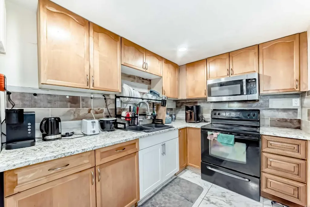 203 Penbrooke Close SE Calgary AB T2A 3N9