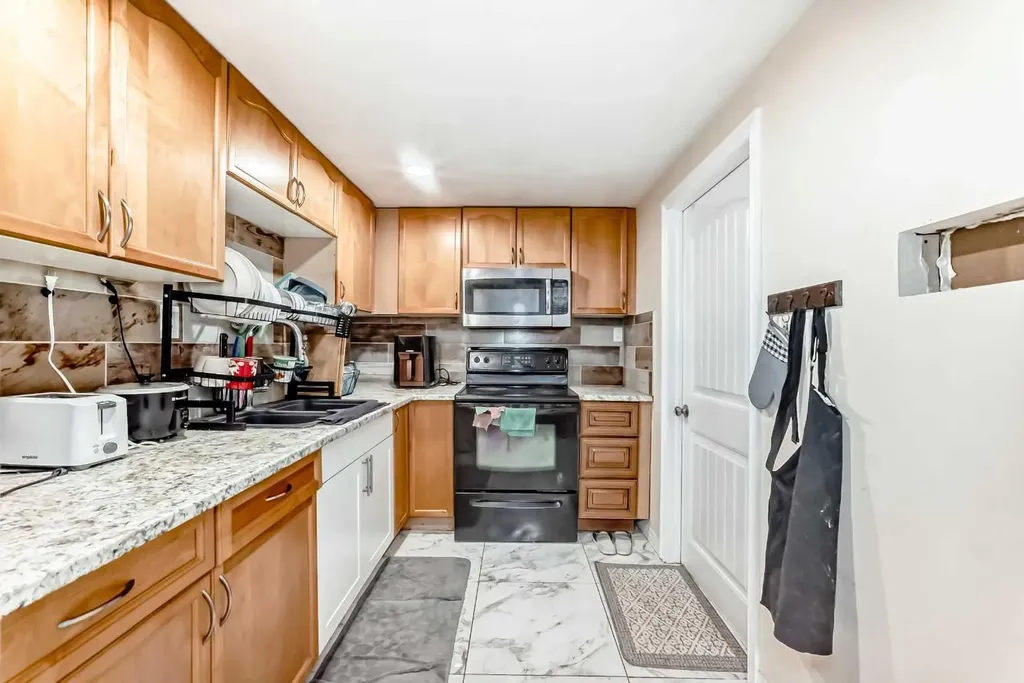 203 Penbrooke Close SE Calgary AB T2A 3N9