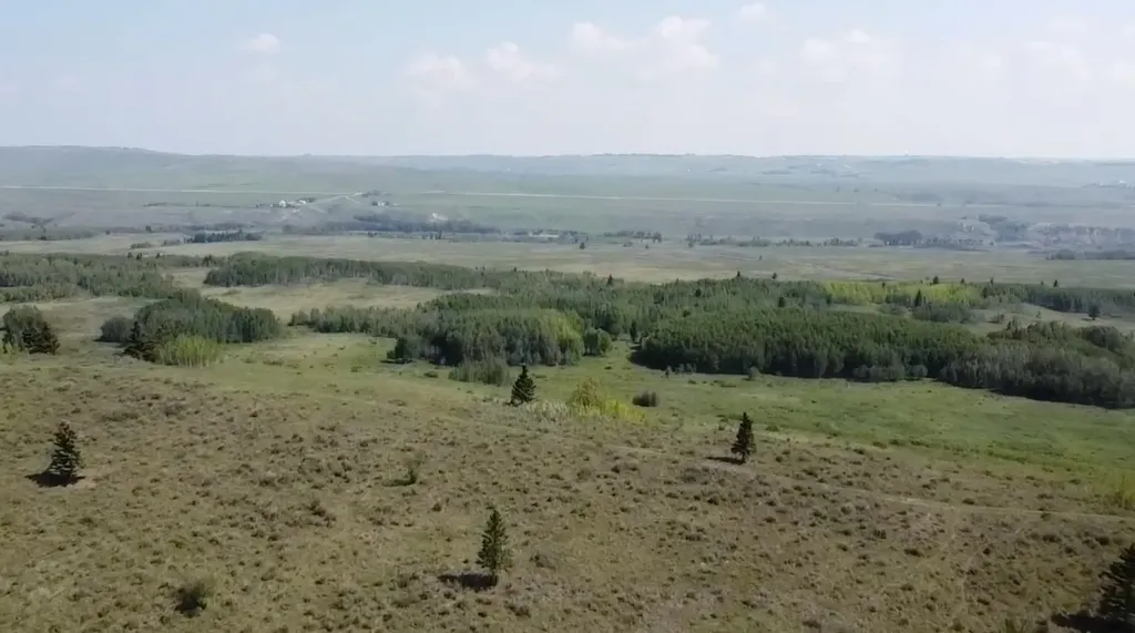 W:5 R:4 T:26 S:7 Q:se &NE,& NW Rural Rocky View County AB T0L1N0