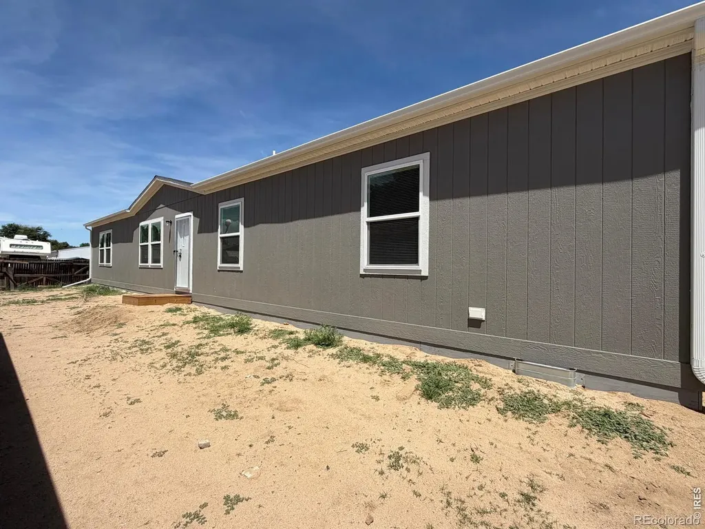 103 Beach Drive Log Lane Village CO 80705