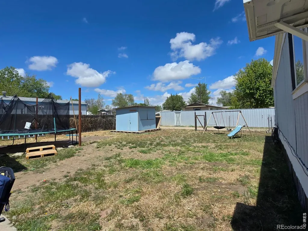 210 Oak Street Log Lane Village CO 80705