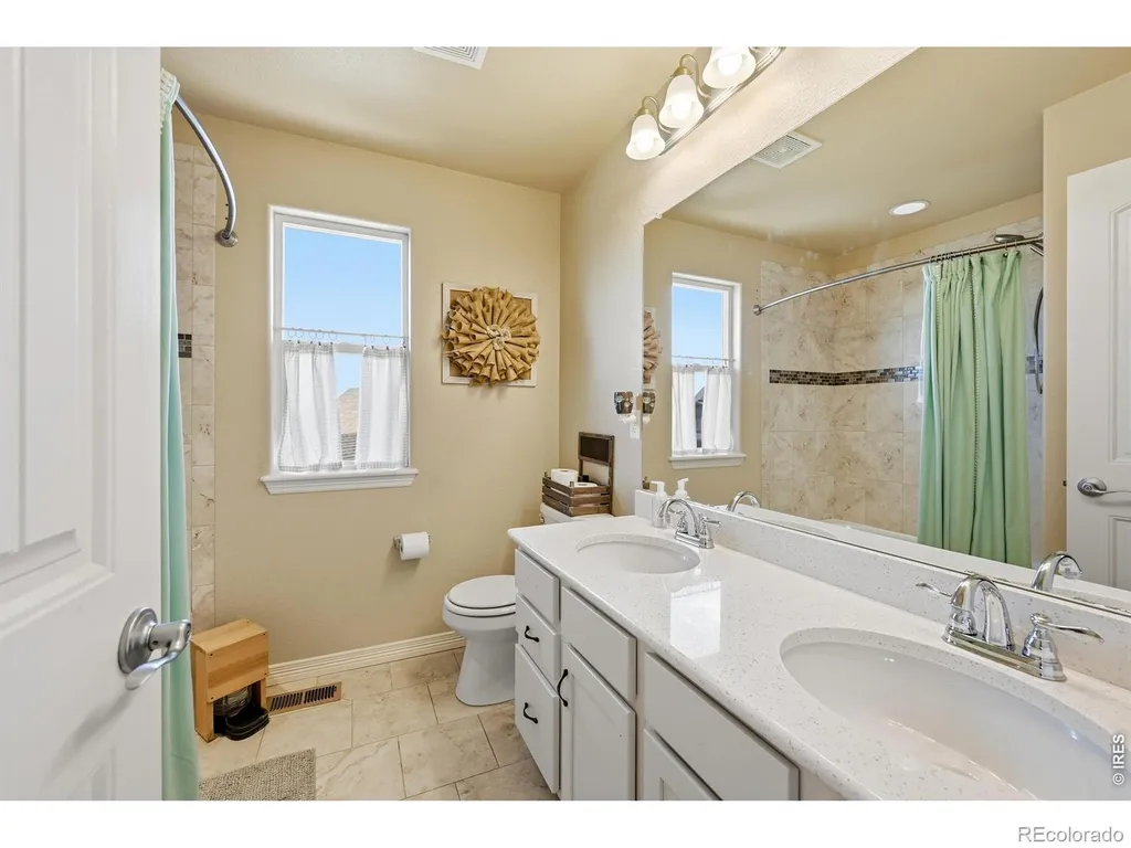 671 Vermilion Peak Drive Windsor CO 80550
