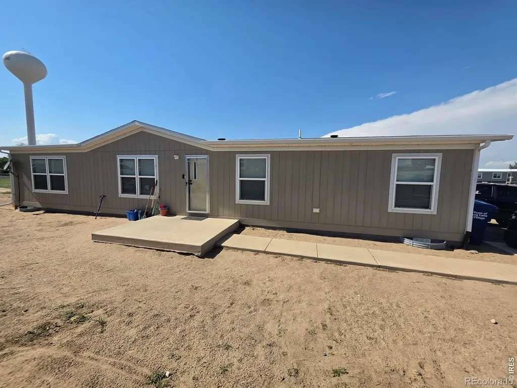 209 Larch Drive Log Lane Village CO 80705