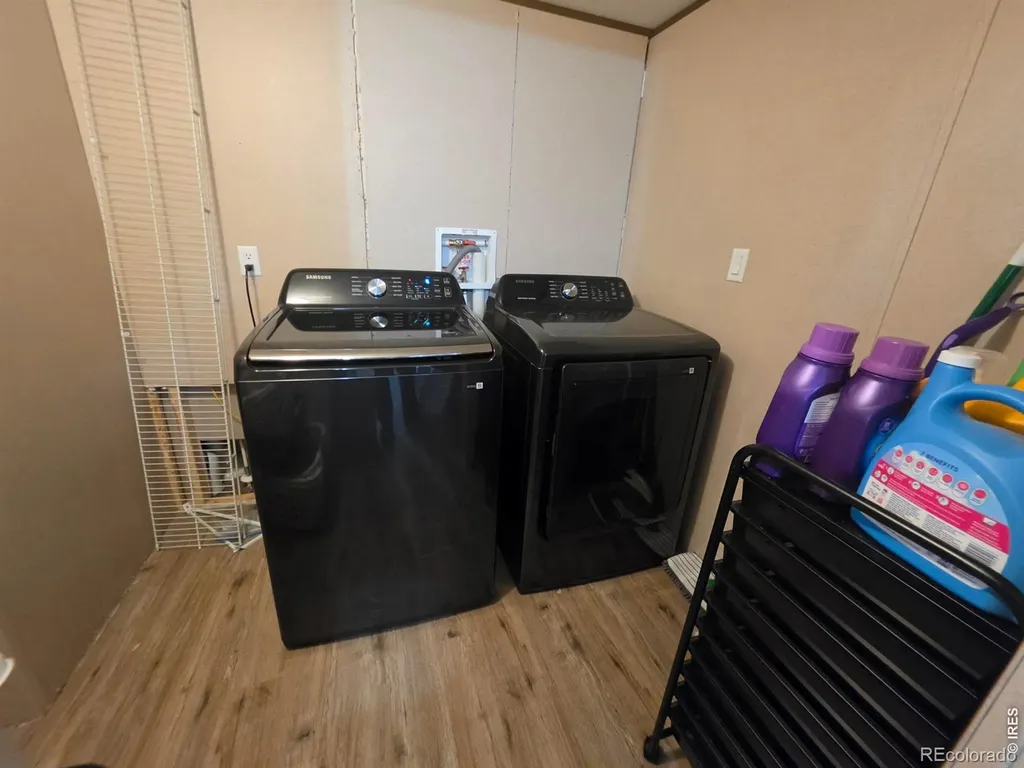 209 Larch Drive Log Lane Village CO 80705