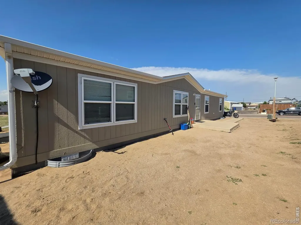 209 Larch Drive Log Lane Village CO 80705
