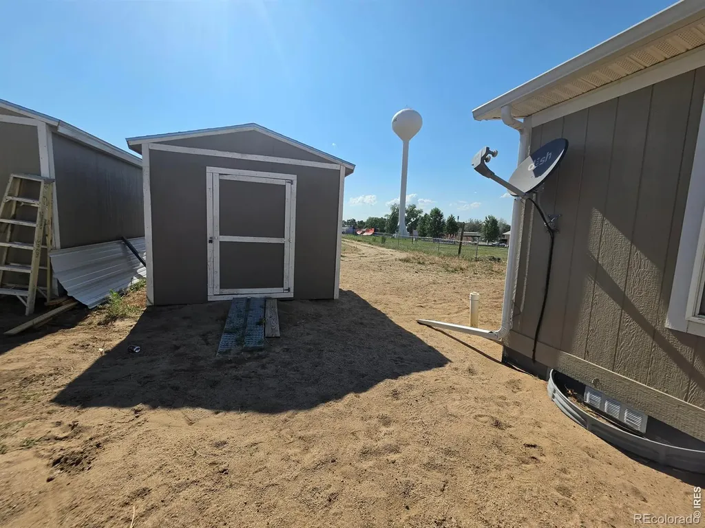 209 Larch Drive Log Lane Village CO 80705