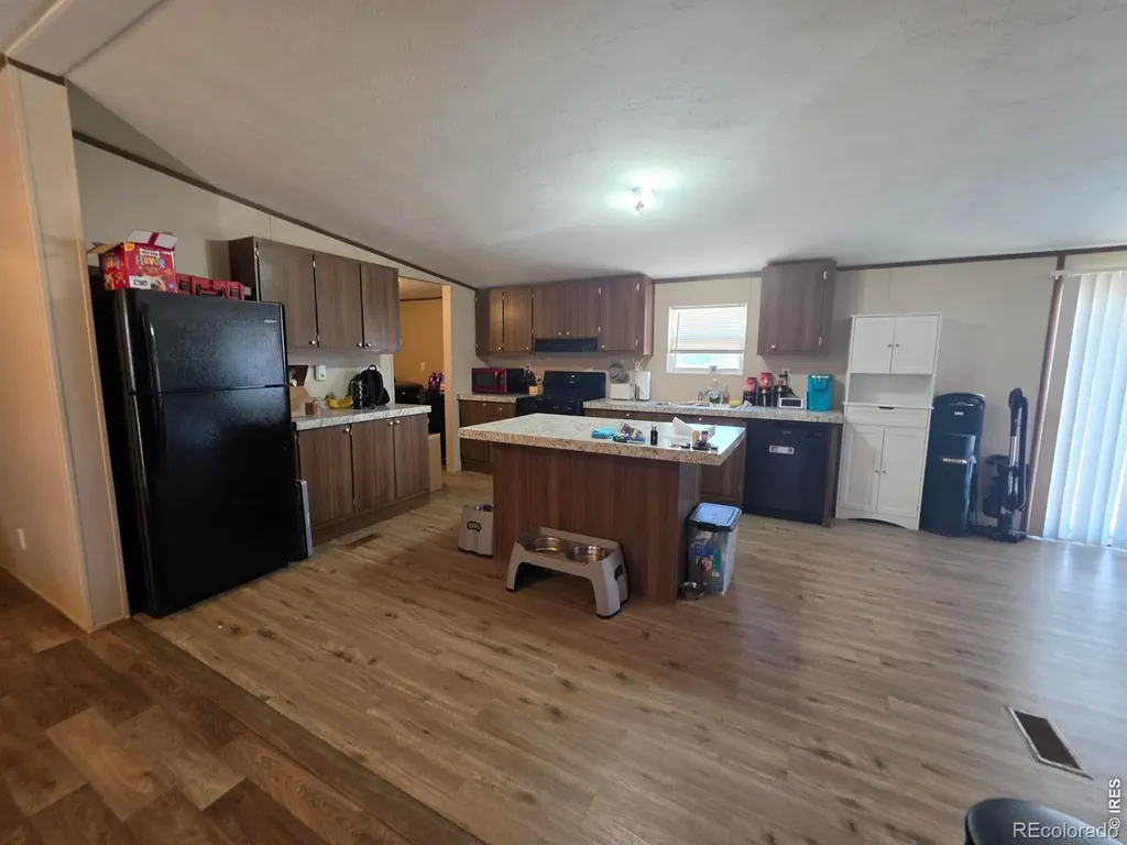 209 Larch Drive Log Lane Village CO 80705
