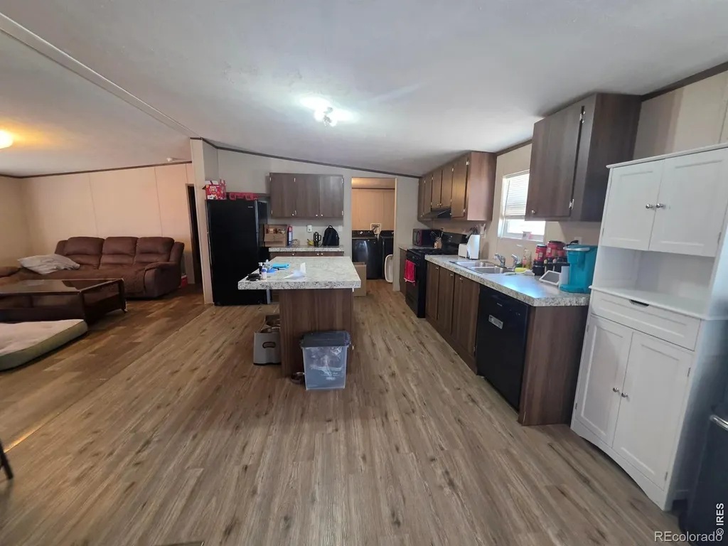 209 Larch Drive Log Lane Village CO 80705