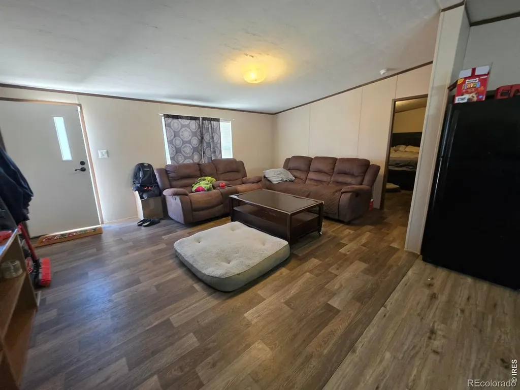 209 Larch Drive Log Lane Village CO 80705
