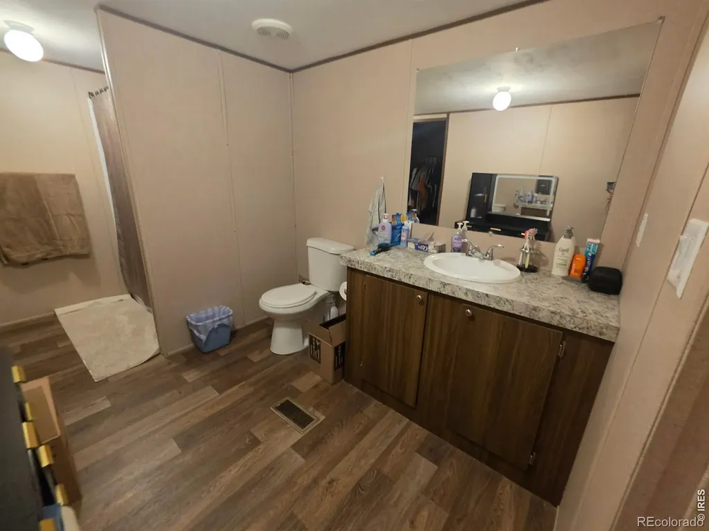 209 Larch Drive Log Lane Village CO 80705