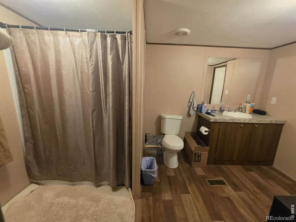 209 Larch Drive Log Lane Village CO 80705