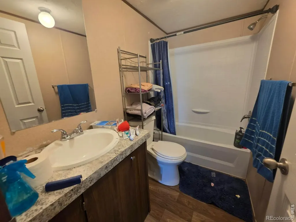 209 Larch Drive Log Lane Village CO 80705