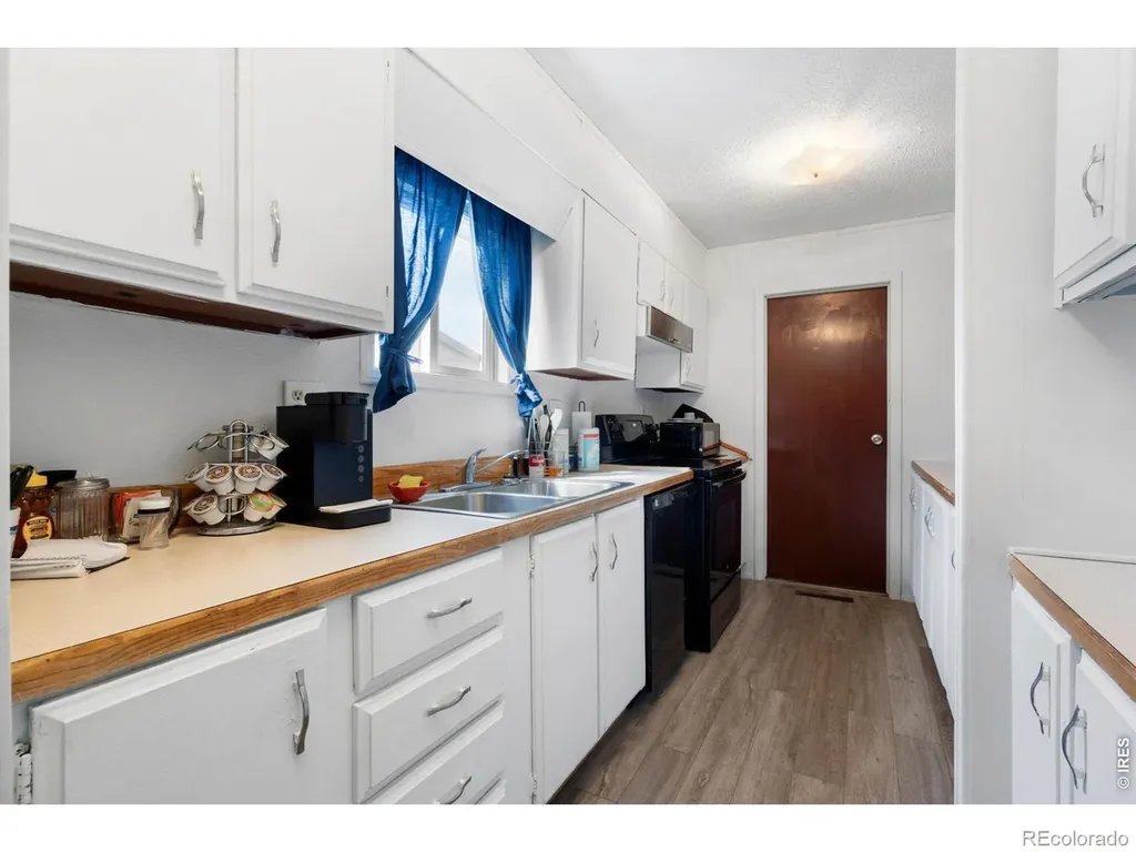 110 Ash Street Log Lane Village CO 80705