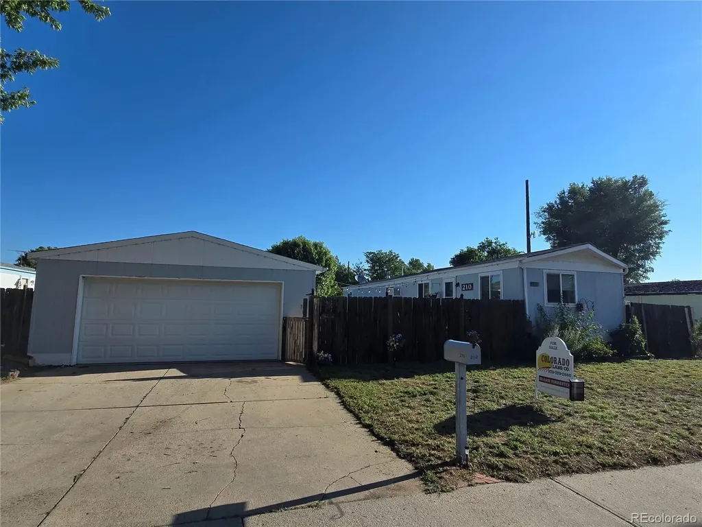 210 Oak Street Log Lane Village CO 80705