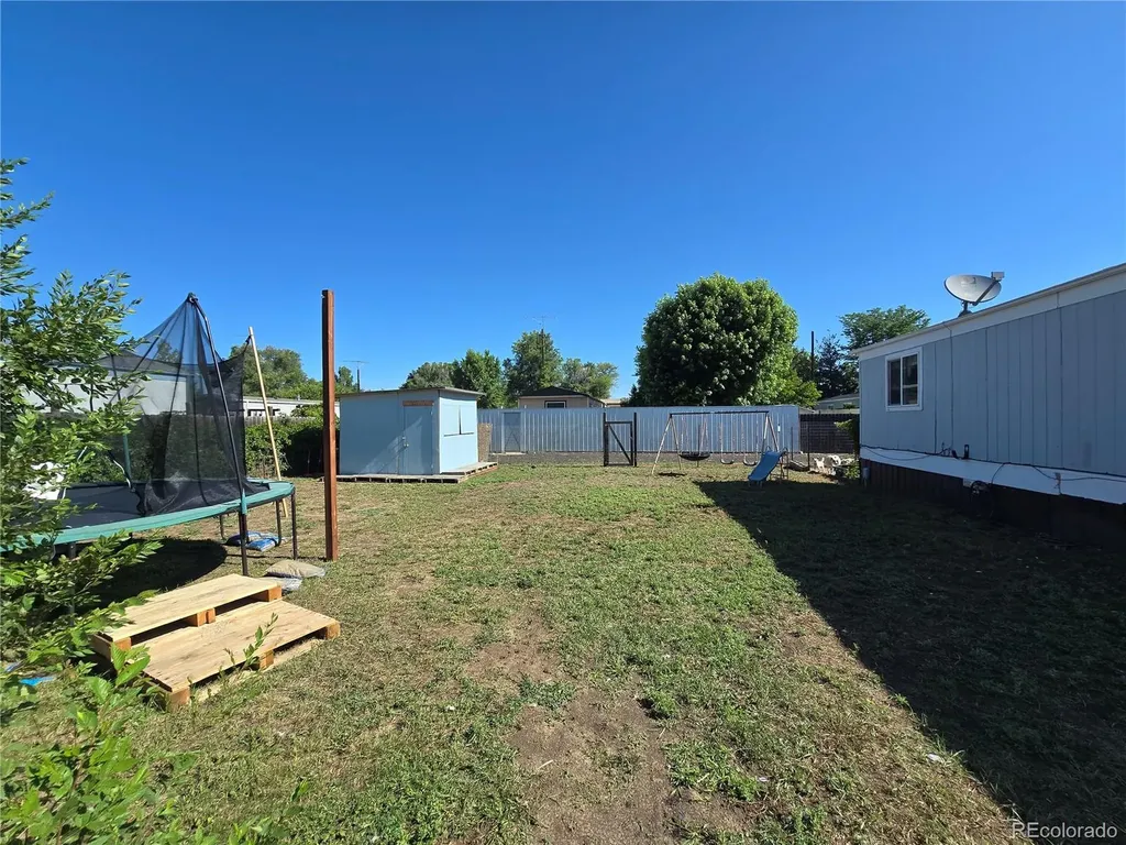 210 Oak Street Log Lane Village CO 80705