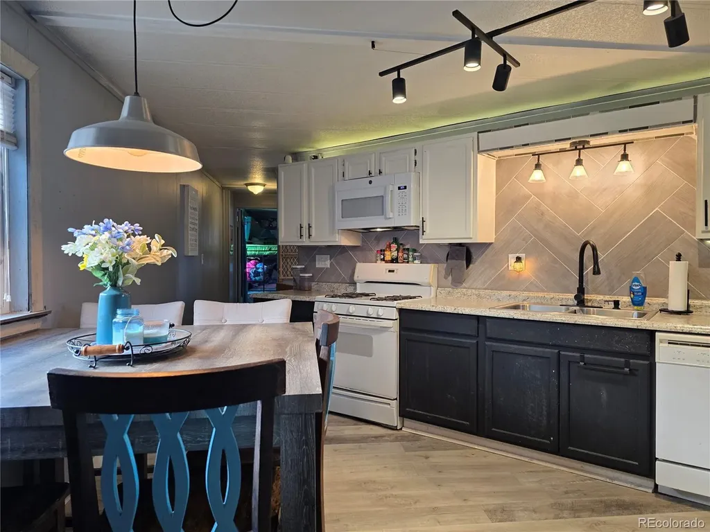 210 Oak Street Log Lane Village CO 80705