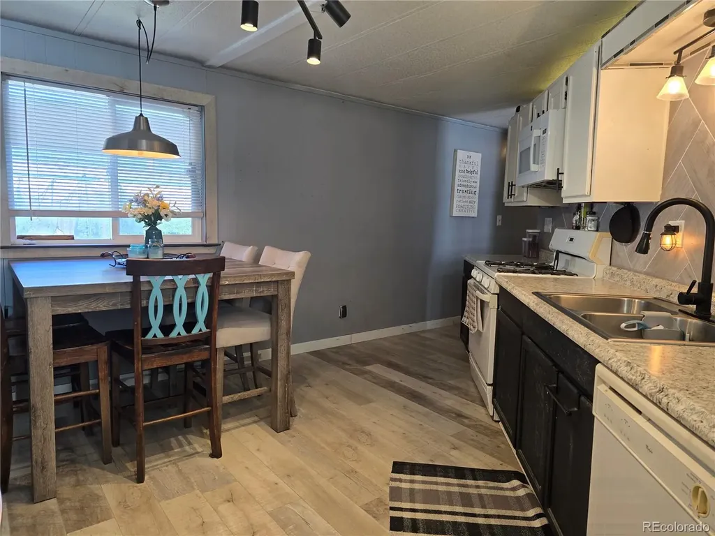 210 Oak Street Log Lane Village CO 80705