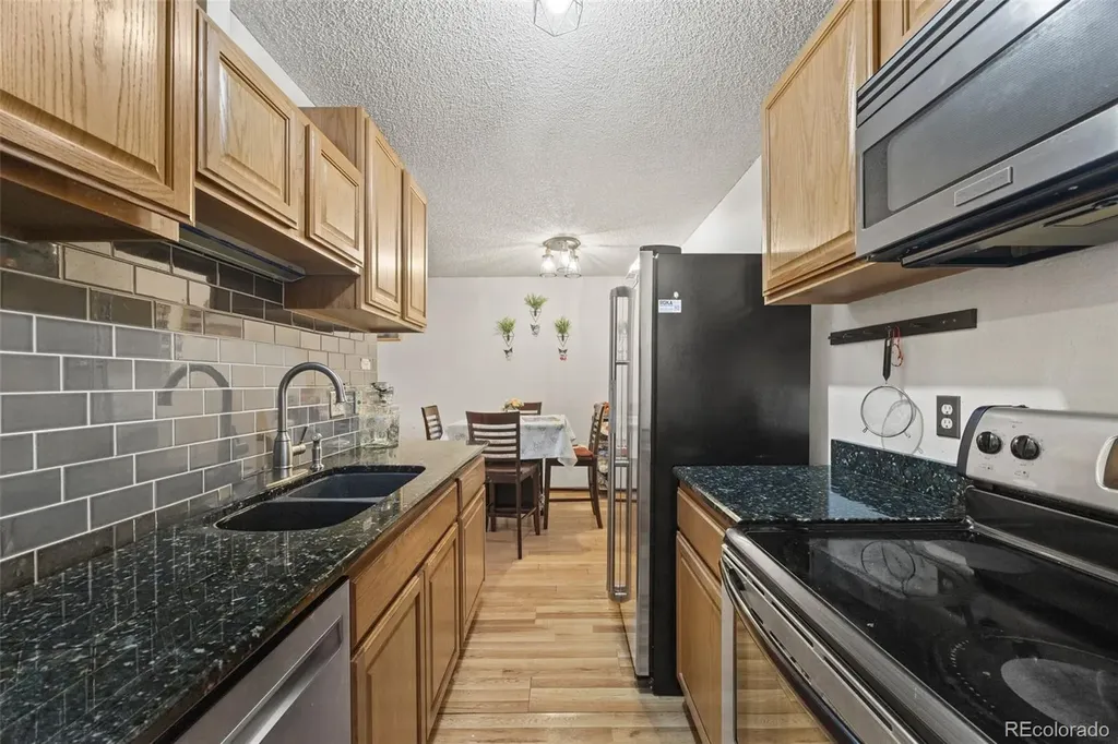 10211 Ura Lane Denver CO 80260