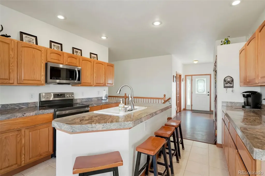 57443 E Geddes Avenue Strasburg CO 80136