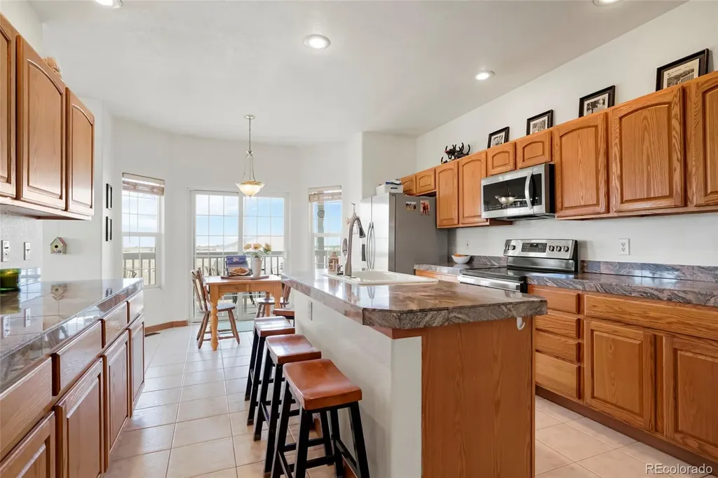 57443 E Geddes Avenue Strasburg CO 80136