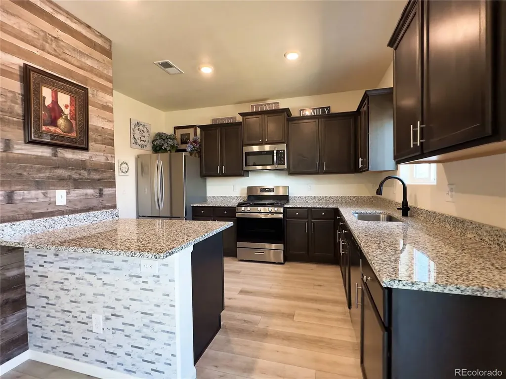 207 Clayton Avenue Keenesburg CO 80643