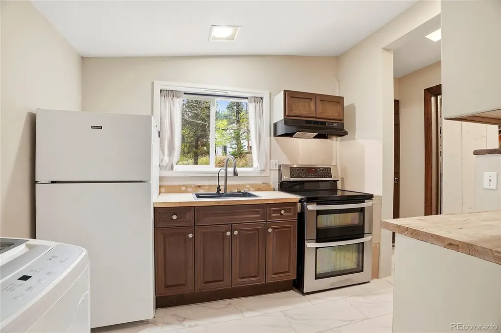 14032 S Olive Avenue Pine CO 80470