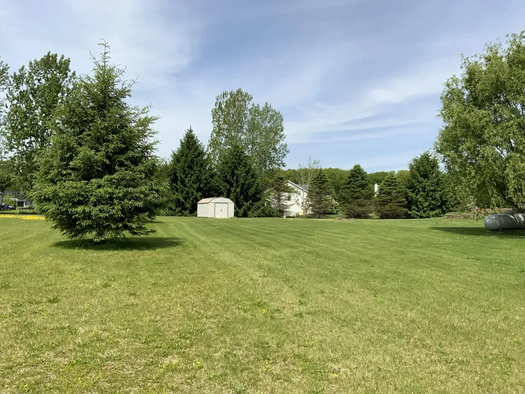 7715 Hidden Knoll Court NE Conway Township MI 48418