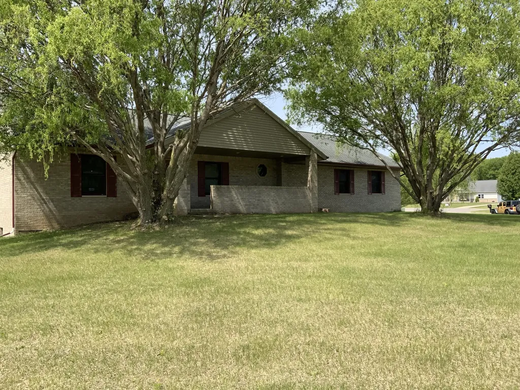7715 Hidden Knoll Court NE Conway Township MI 48418