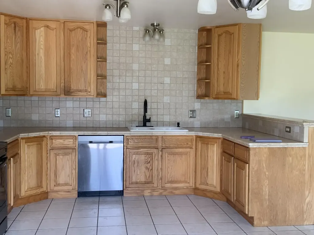 7715 Hidden Knoll Court NE Conway Township MI 48418