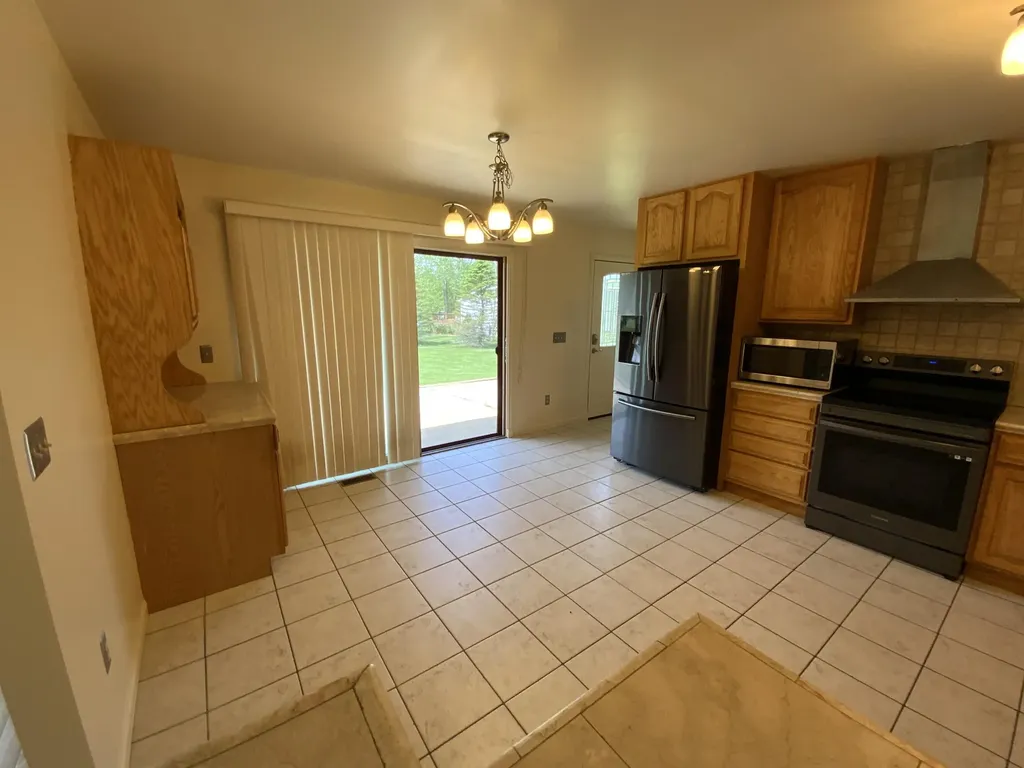 7715 Hidden Knoll Court NE Conway Township MI 48418