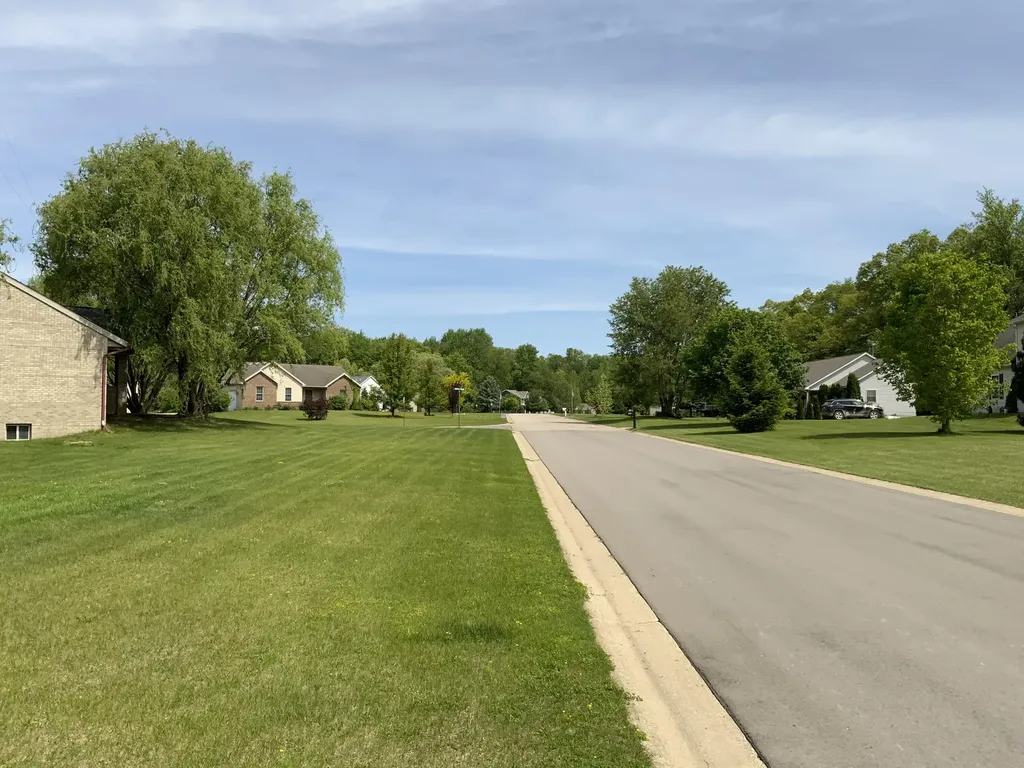 7715 Hidden Knoll Court NE Conway Township MI 48418