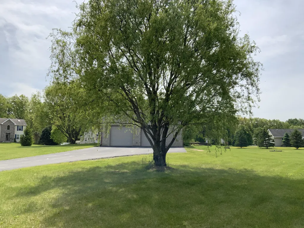 7715 Hidden Knoll Court NE Conway Township MI 48418