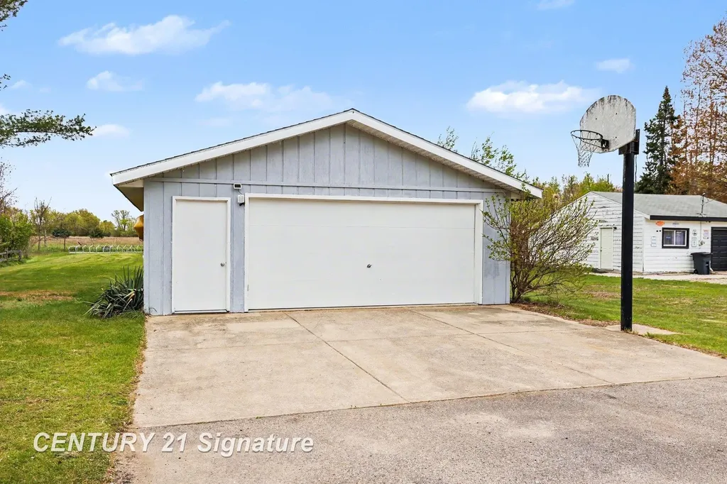 1361 Mckimmy Drive Tobacco Township MI 48612