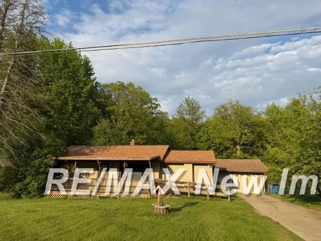 803 S Woodcock Road Homer Township MI 48640