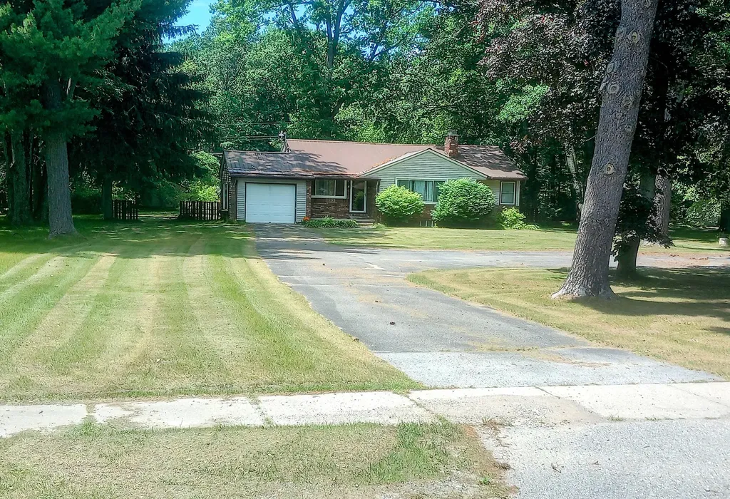 7859 S Michigan Avenue Rothbury Village MI 49452