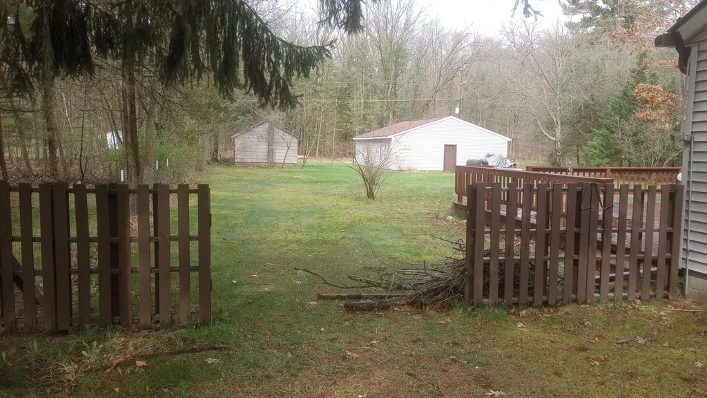 7859 S Michigan Avenue Rothbury Village MI 49452