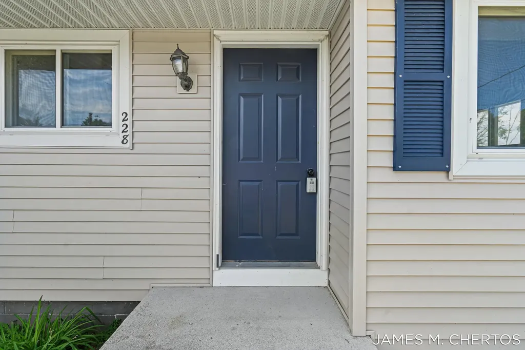 228 South Street Spring Lake Village MI 49456