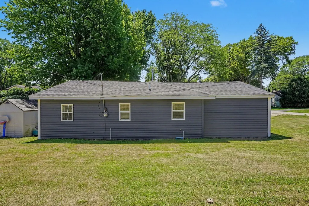 1261 Van Portfliet Drive NW Walker City MI 49534