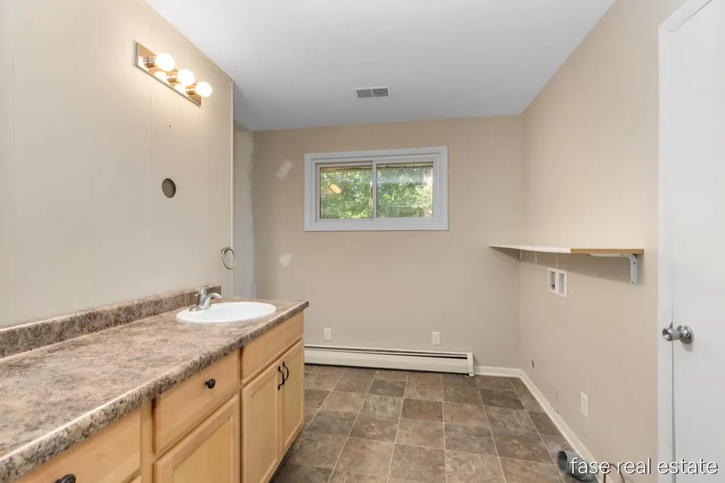 7676 Courtland Drive NE Cannon Township MI 49341